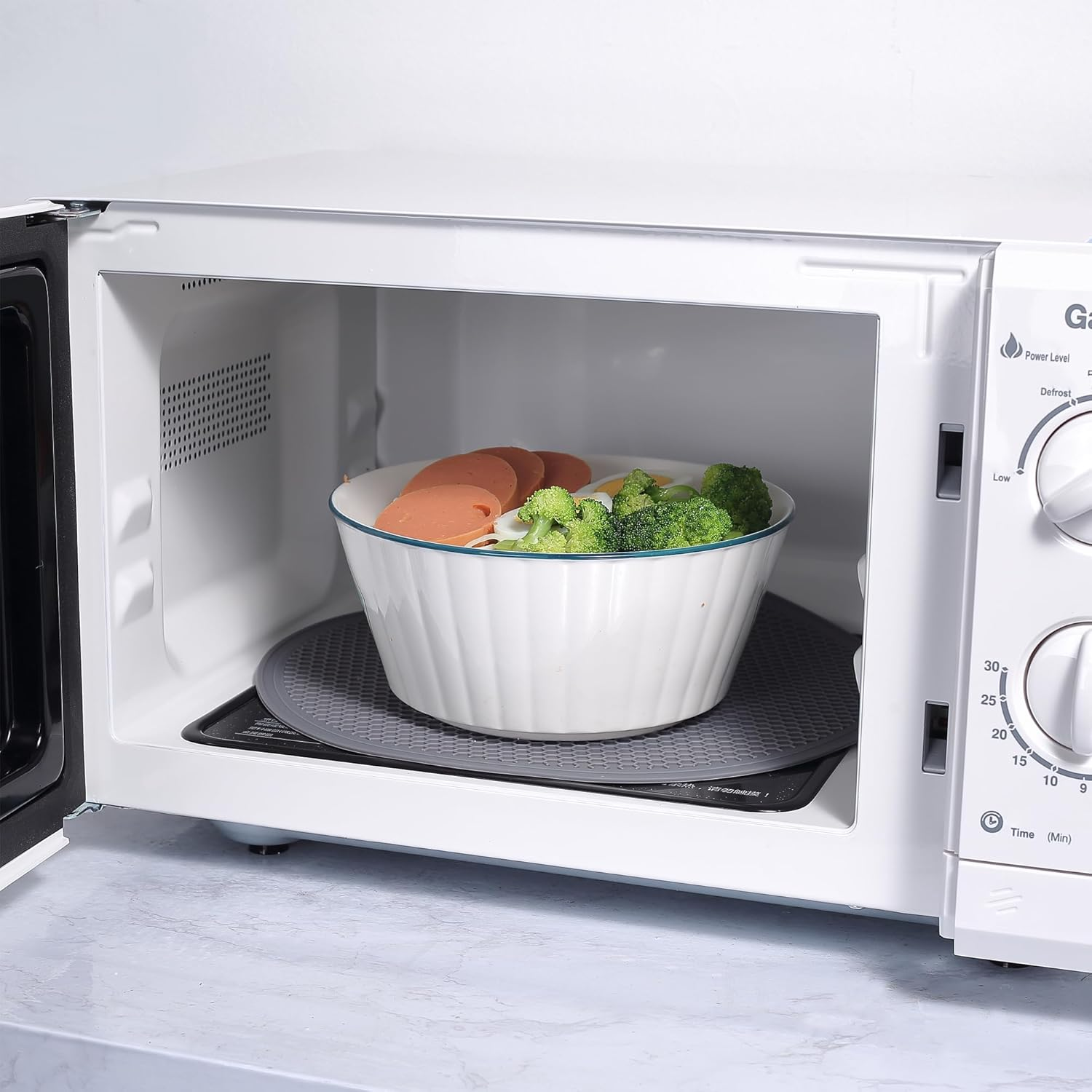 To Encounter Silicone Microwave Mat - round 12" X 12" - Set of 2 Heat Resistant Multifunctional Mat, Splatter Guard, Trivet, Hot Pad, Pot Holder image number 4