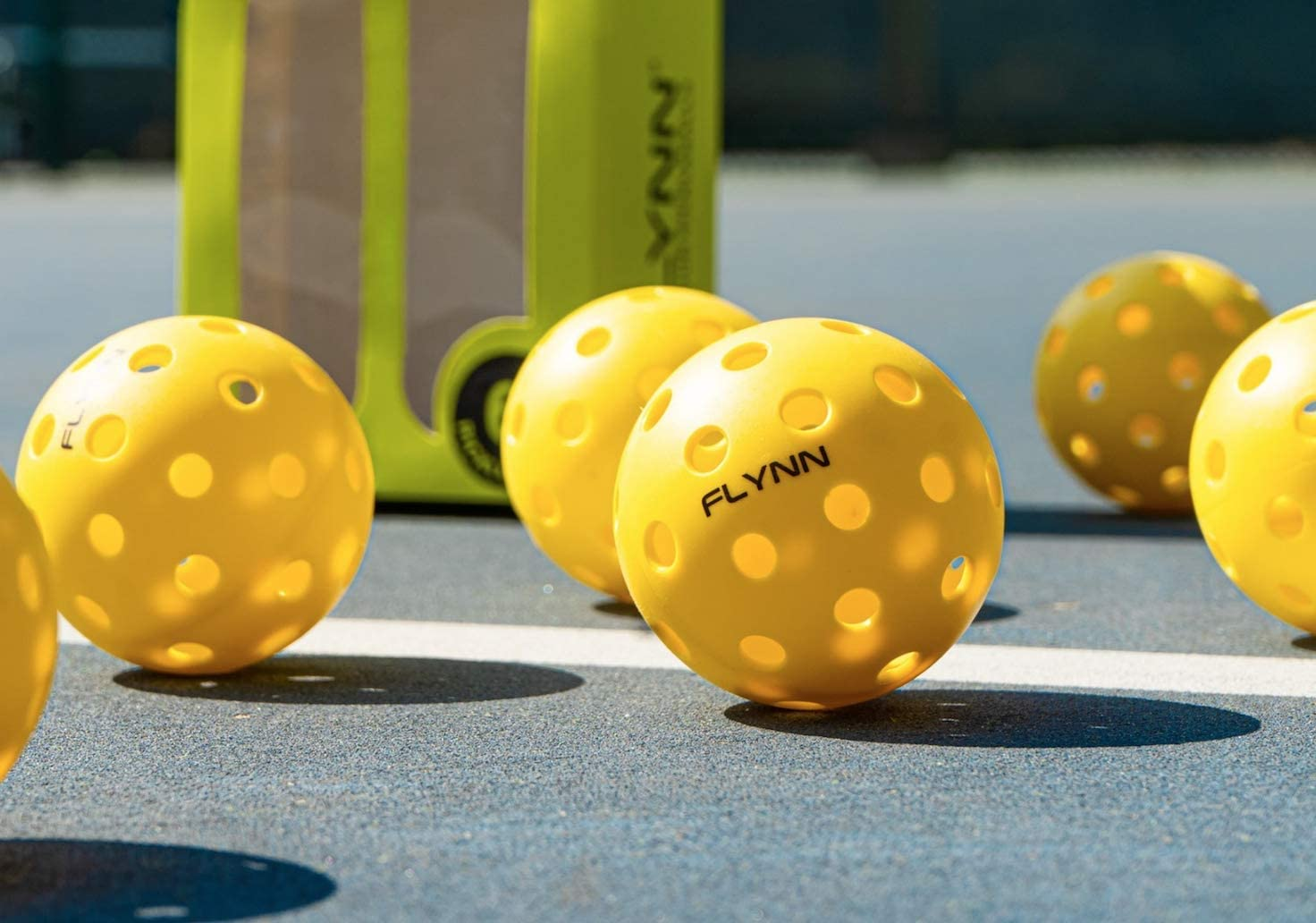 Flynn Outdoor Pickleball Balls - 6 Pickleballs per Pack. Bright Yellow, 40 Holes for True Flight, Consistent Bounce, Suitable for Outdoor Pickleball Practice and Match Play. image number 4
