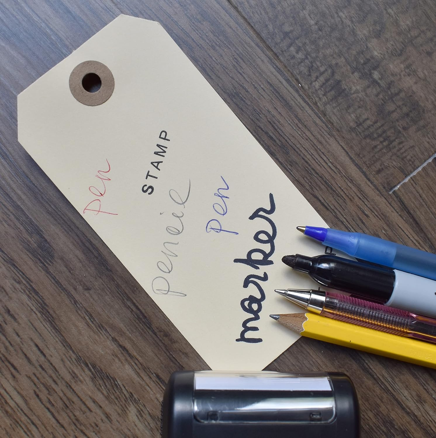 Tags with Elastic String Attached - #5, 4 3/4" X 2 3/8" Box of 200 Manila Paper Label Tags with Elastic Loop and Reinforced Hole image number 6