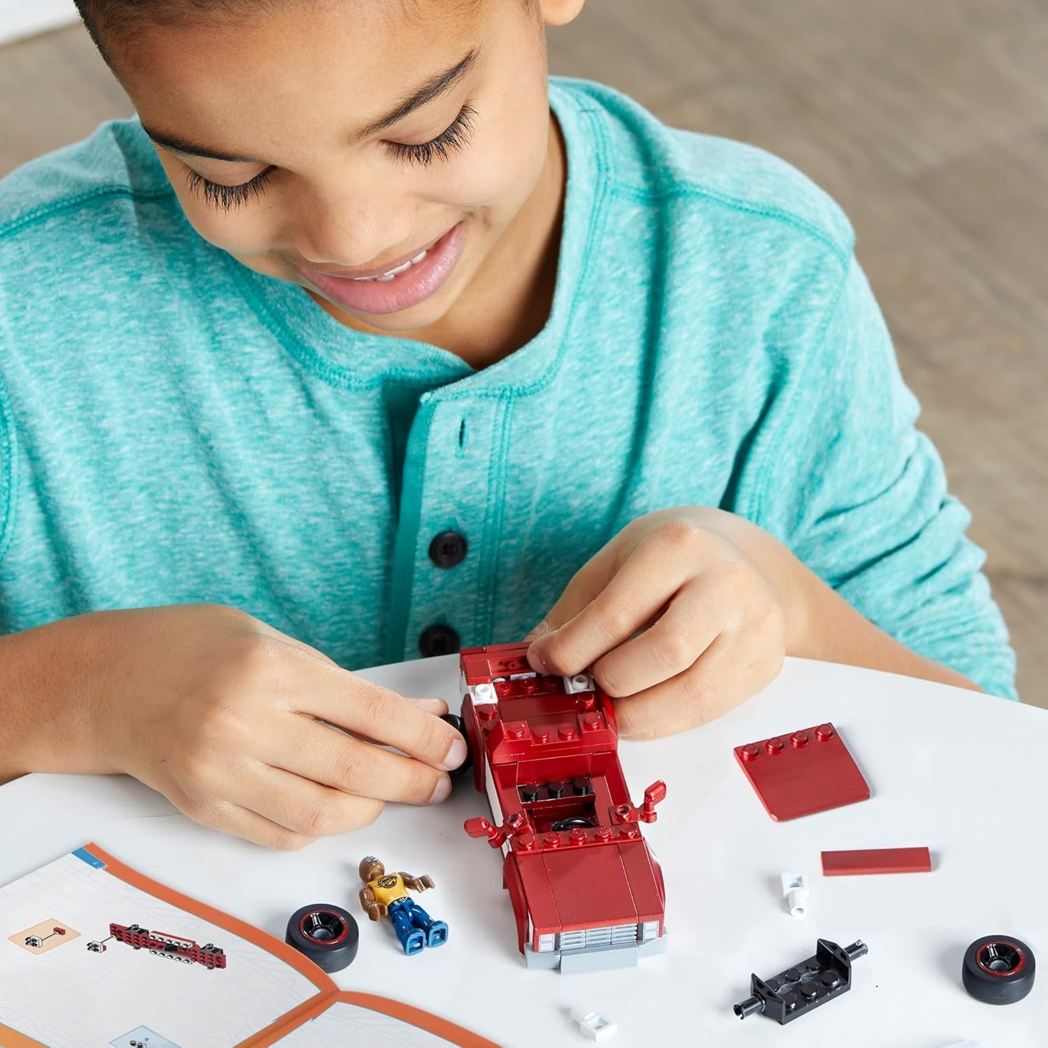 Hot Wheels MEGA 83 Chevy Silverado Real Racecar Building Set with 89 Pieces with Micro Figure Driver Figure, Toy Gift Set for Ages 5 and Up image number 4