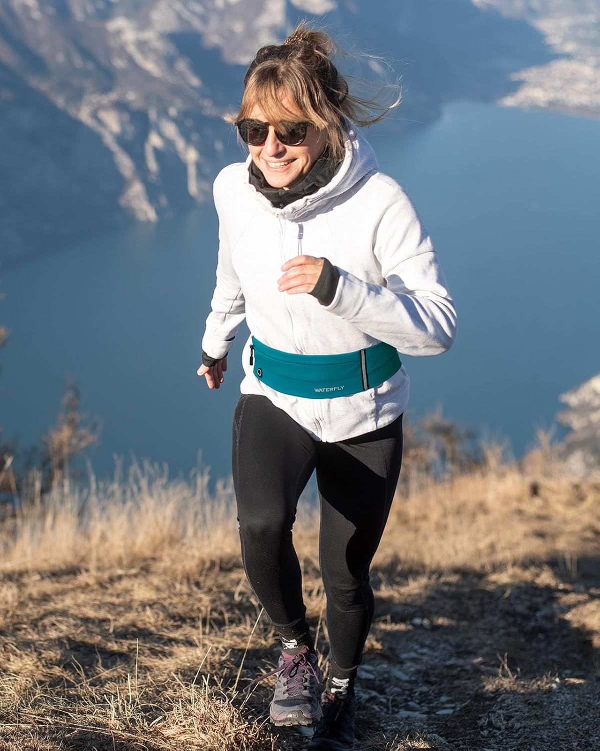 WATERFLY Running Belt Fanny Pack: Slim Elastic Sport Workout Waistband for Men and Women, Jogging Runner Phone Holder Belt, Marathon Jogger Waist Bag image number 2