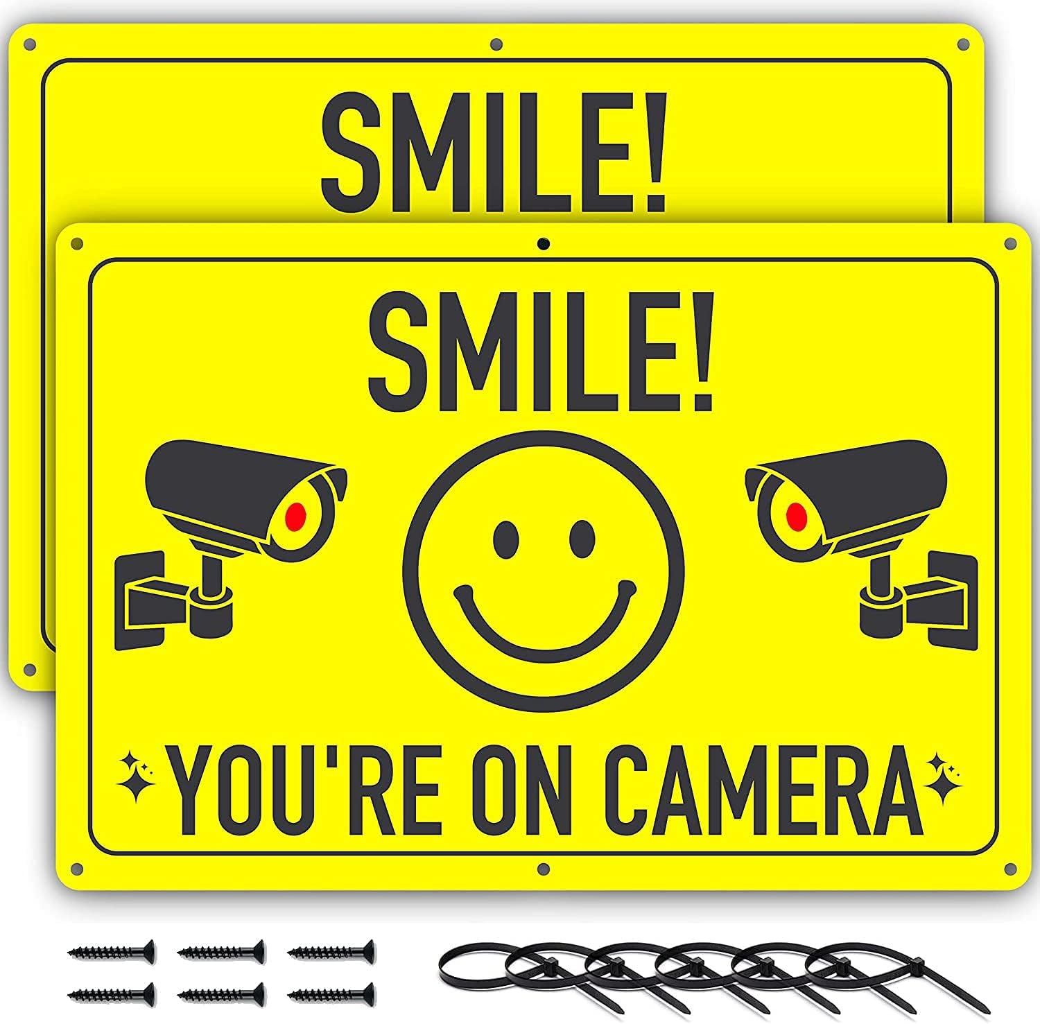 ASSURED SIGNS Smile You'Re on Camera Sign - 2 Pack - 11.75 X 8 Inch - Ideal Aluminum Video Surveillance Security Signs to Prevent Trespassing on Private Property - Perfect for House, Business, Yard or Private Driveway image number 3