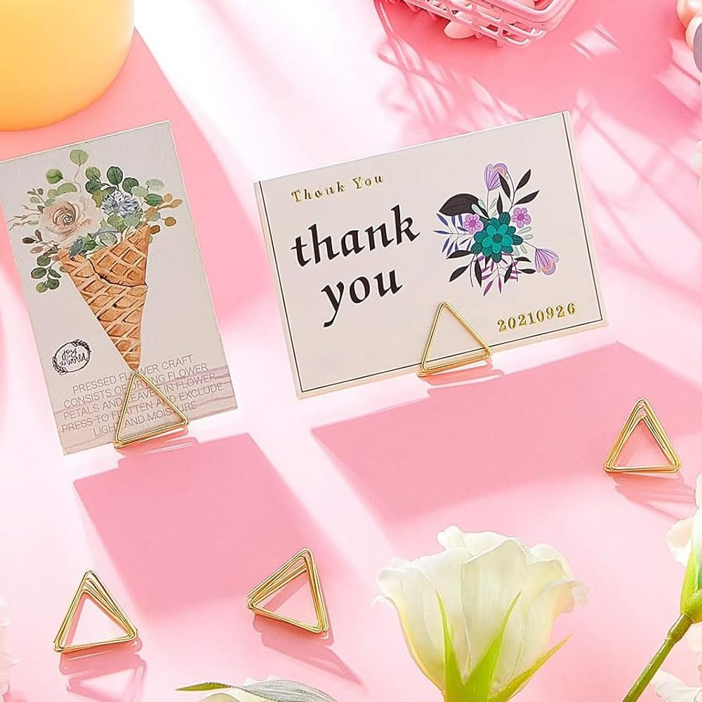 DACUAN Table Card Holders, 40PCS Strong Mini Place Card Holders, Triangle Card Stand Clip Table Number Holders, Golden Photo Holder for Wedding Party Anniversary Party Office